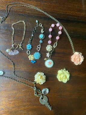Lot of 3 bracelets, 2 necklaces and a charm